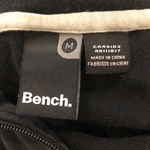 Black bench sweater